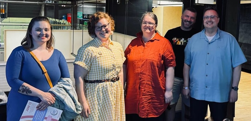 Photo of smiling Rainbow Coalition members